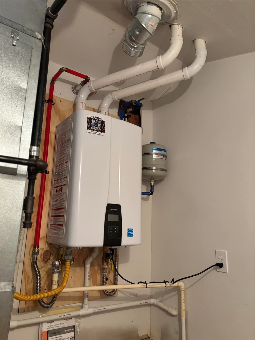 Tankless water heater with expansion tank and copper